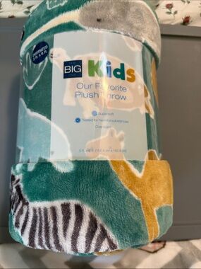 The Big One Kids Plush Throw - Green background
